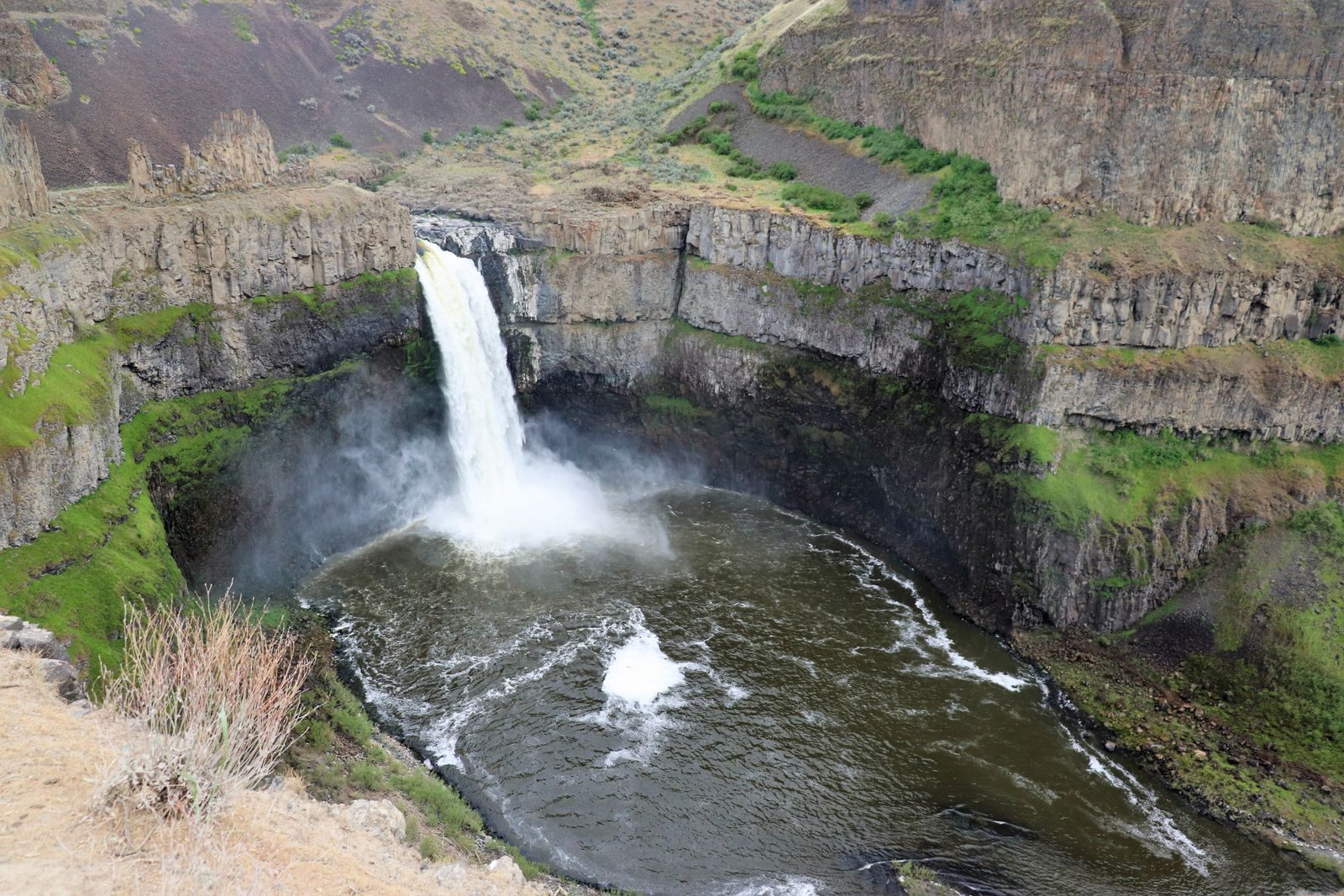 Palouse Falls plunging into a basalt bowl in the canyon country near the Snake River