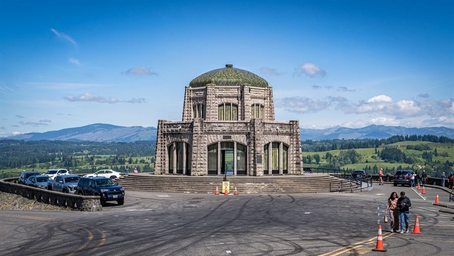 Stone Vista House on Crown Point above the Columbia River Gorge under a blue sky